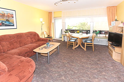 Das Wohnzimmer mit Essecke